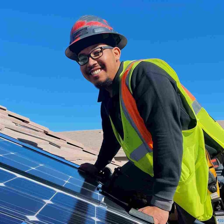 Alejandro Rodriguez employee working on a residential Solar Panels Las Vegas and cleaning_png